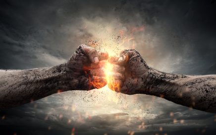 Fight, two fists hitting each other over dramatic sky
