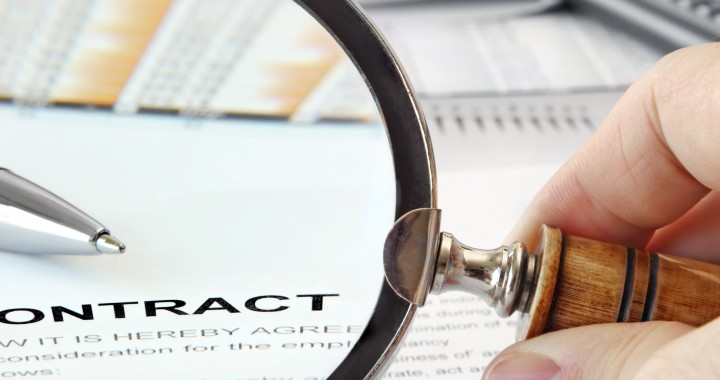 Contracts page: Contract document with magnifying glass